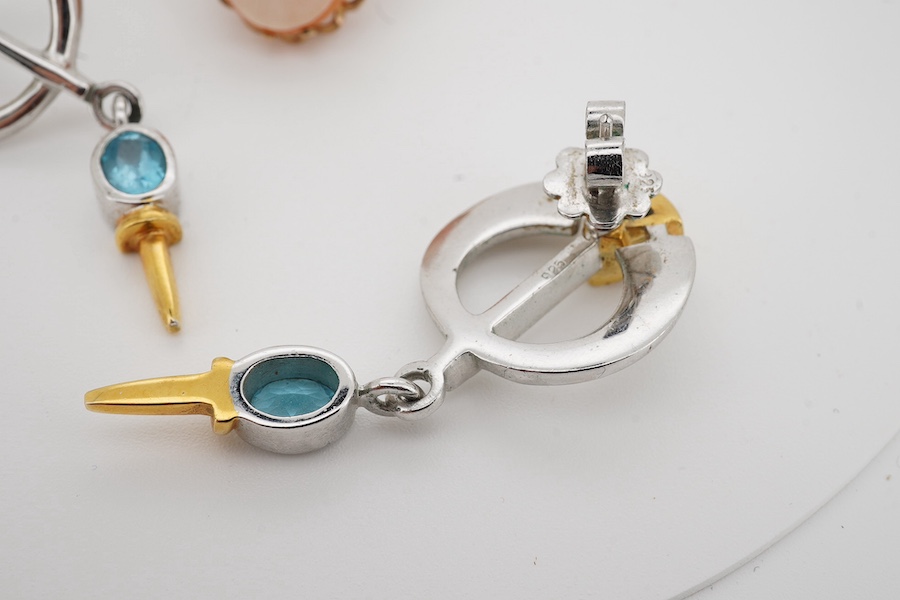 A 9ct gold shell cameo ring, size N, British hallmarks, gross weight 6 grams, and a pair of blue topaz and earrings, mounted in silver, length 5.1cm each, post fittings, Condition: good